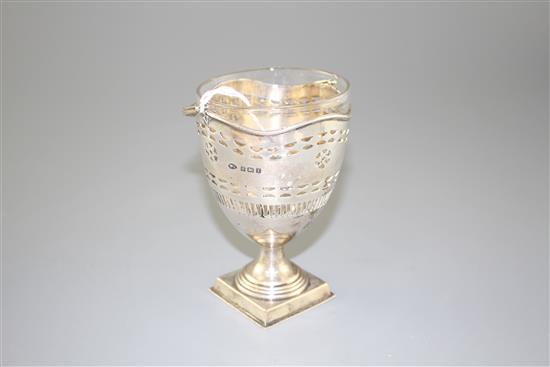 An Edwardian pierced silver sugar basket by William Aitken, Birmingham, 1908, height excluding handle,12.5cm, 4.5oz,